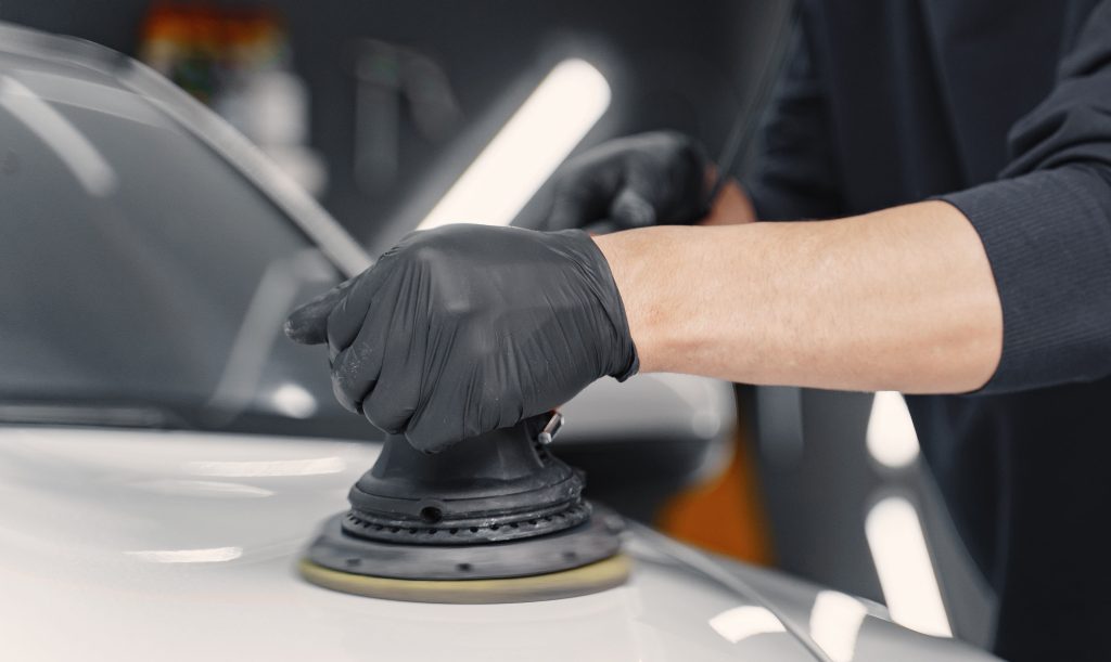 man polish car garage (1)